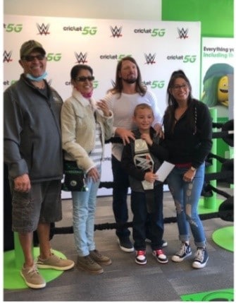 AJ Styles poses with fans